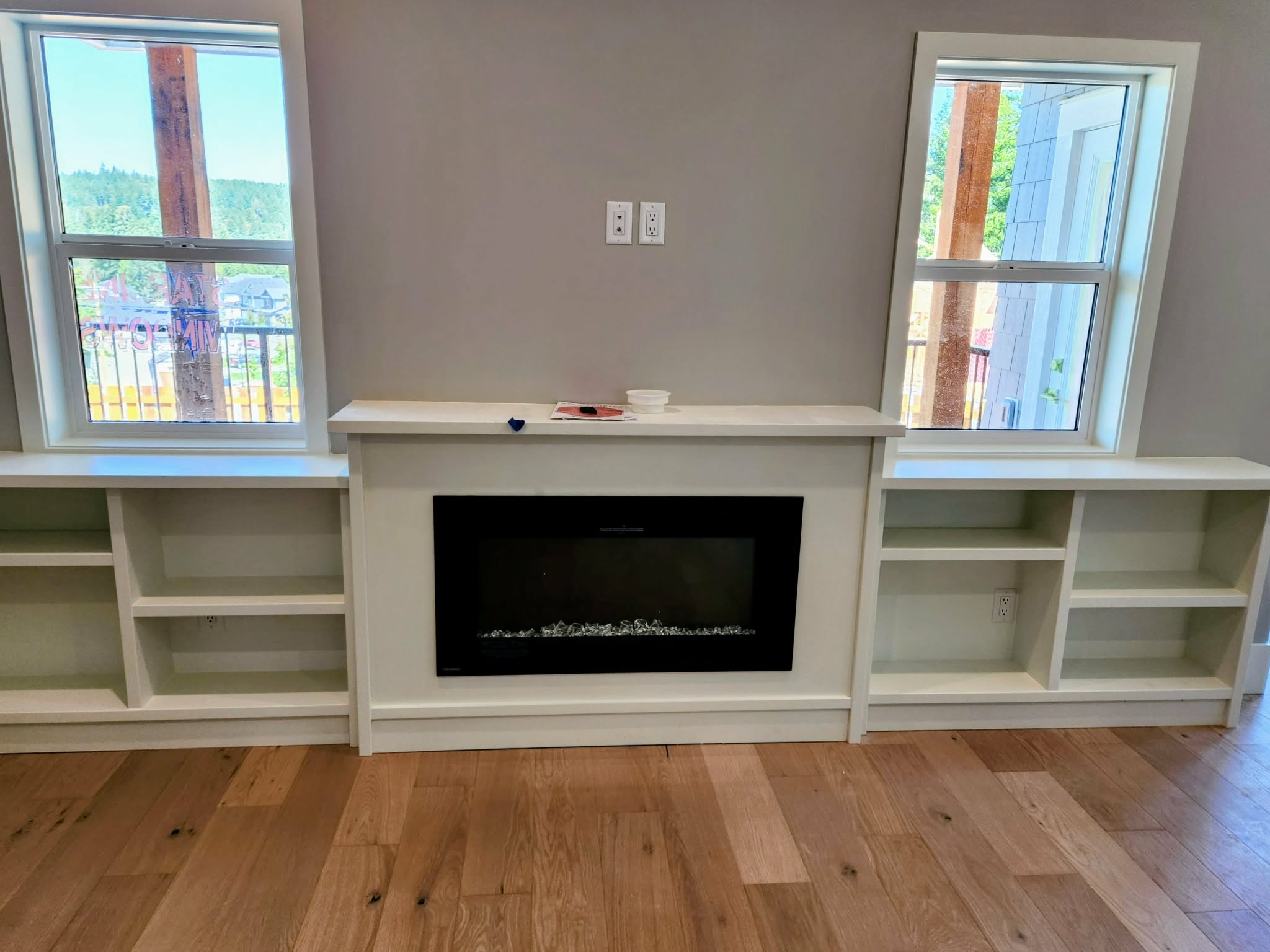 Custom fireplace and bookcase surround by Jim Rotz, Victoria BC